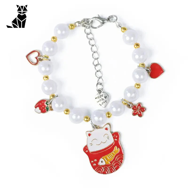 Bracelet avec breloque chat rouge et blanc, parfait pour les occasions spéciales - Bavette en plastique durable